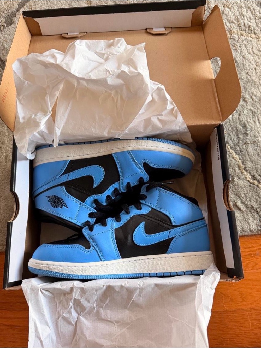 Jordan University Blue Mids